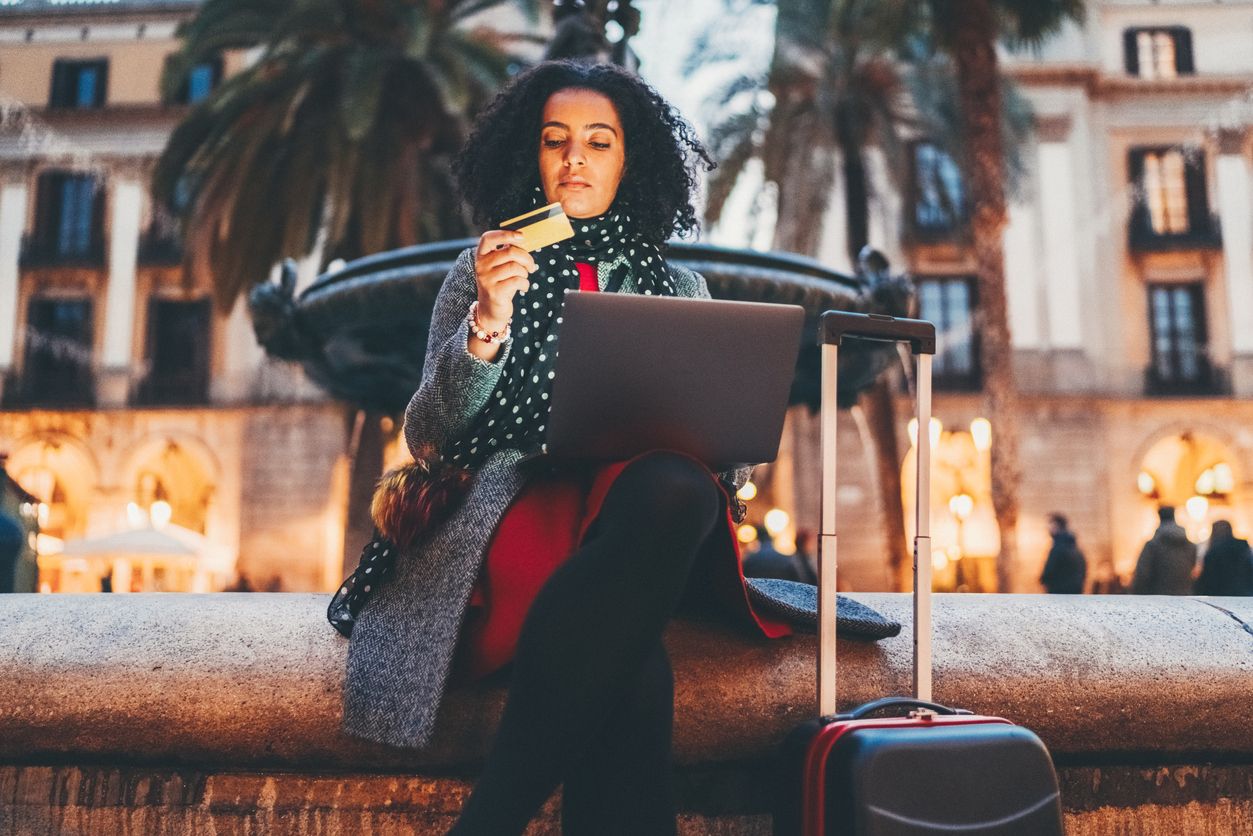 Businesswoman booking hotel