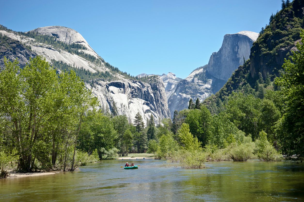 Rafters float down the Merced River in Yosemite Valley, Yosemite National Park