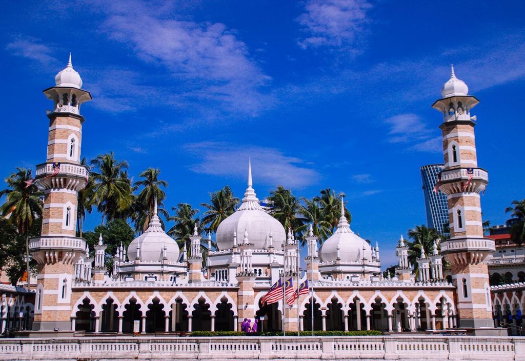 Masjid Jamek Kuala Lumpur with a blue sky