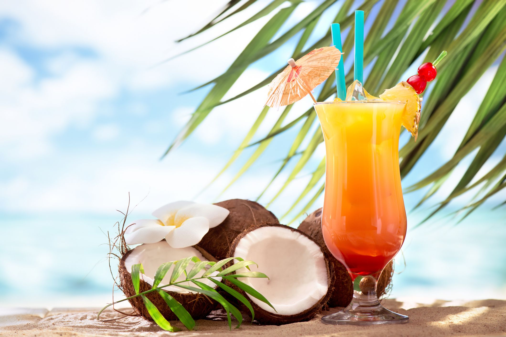 Tequila sunrise cocktail on the beach