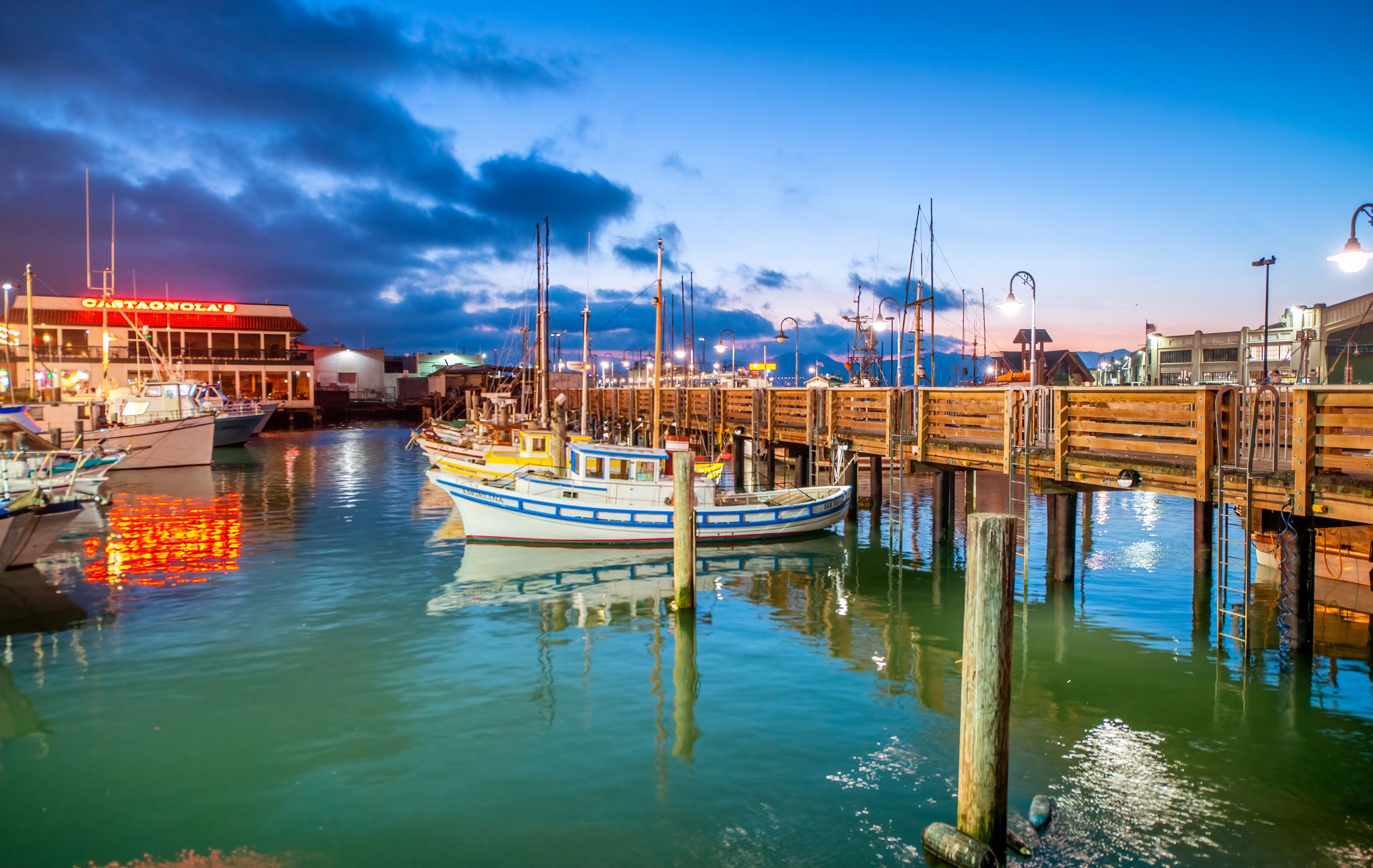Boats in Fisherman's Wharf at night, San Francisco