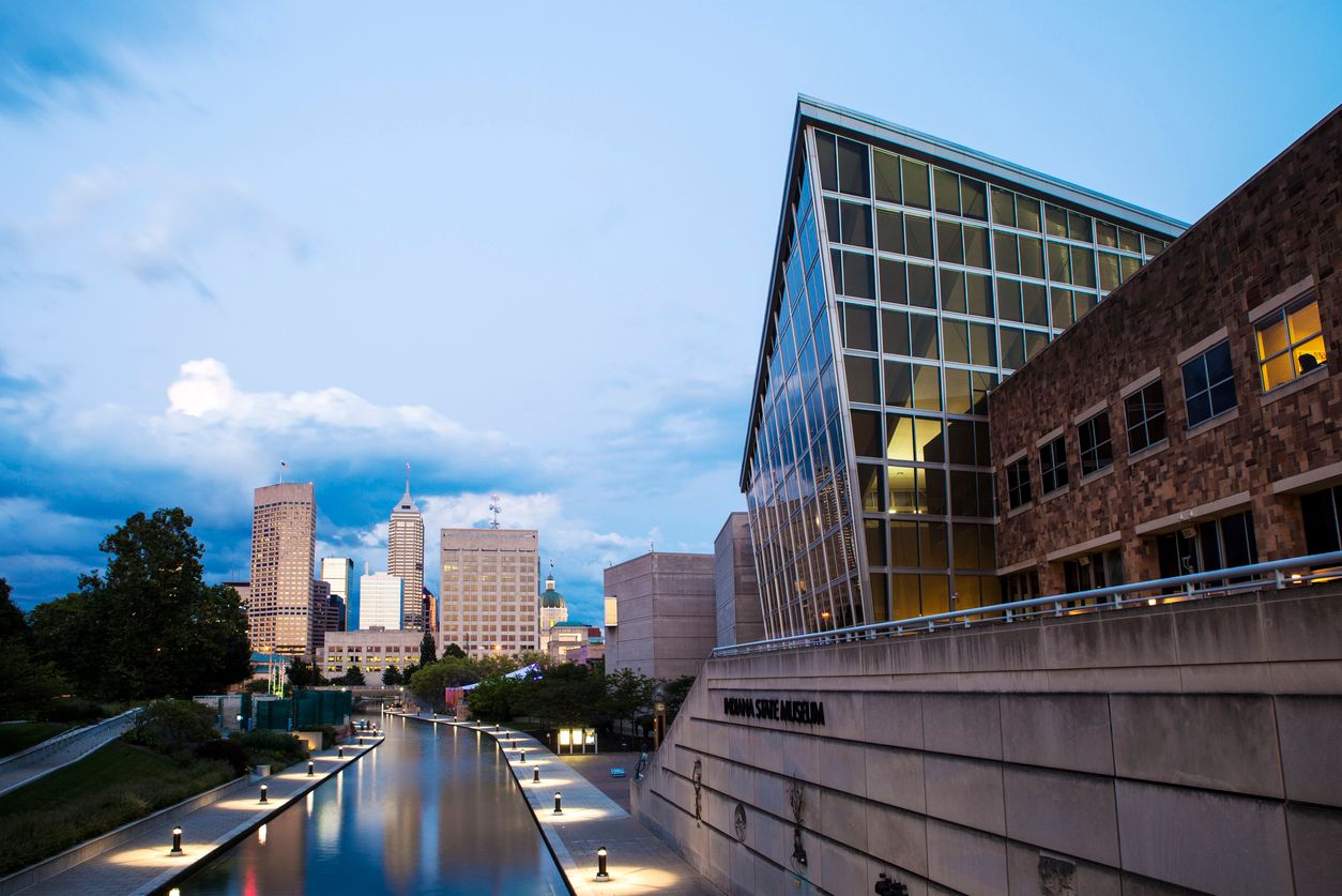 Downtown Indianapolis with the canal walk and Indiana State Museum in the foreground