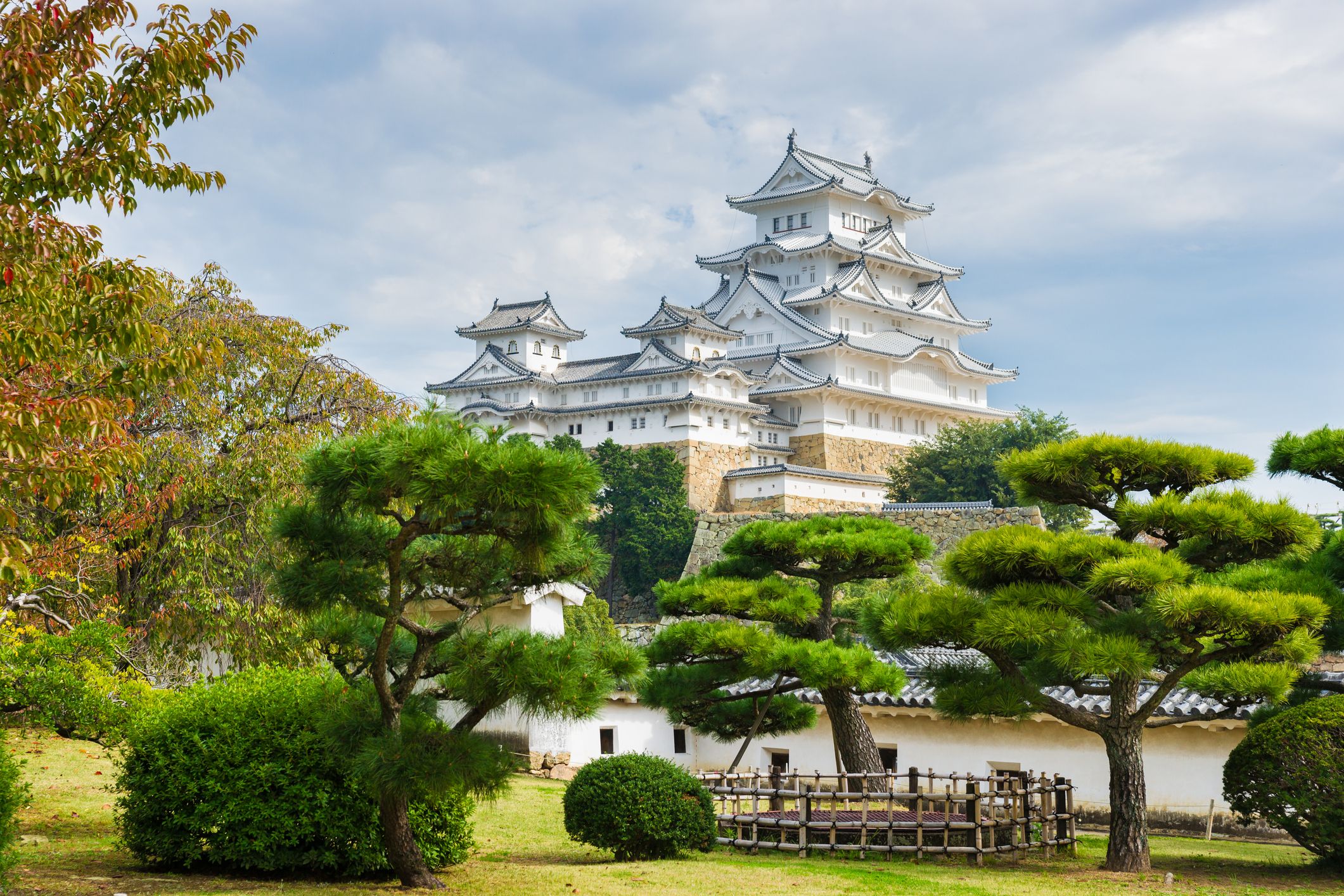 Samurai Himeji Castle with Red Fall Leafs in Japan