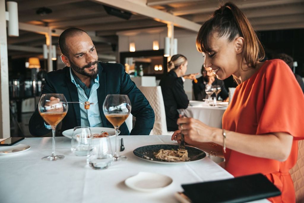 Elegant couple dining in a luxury restaurant