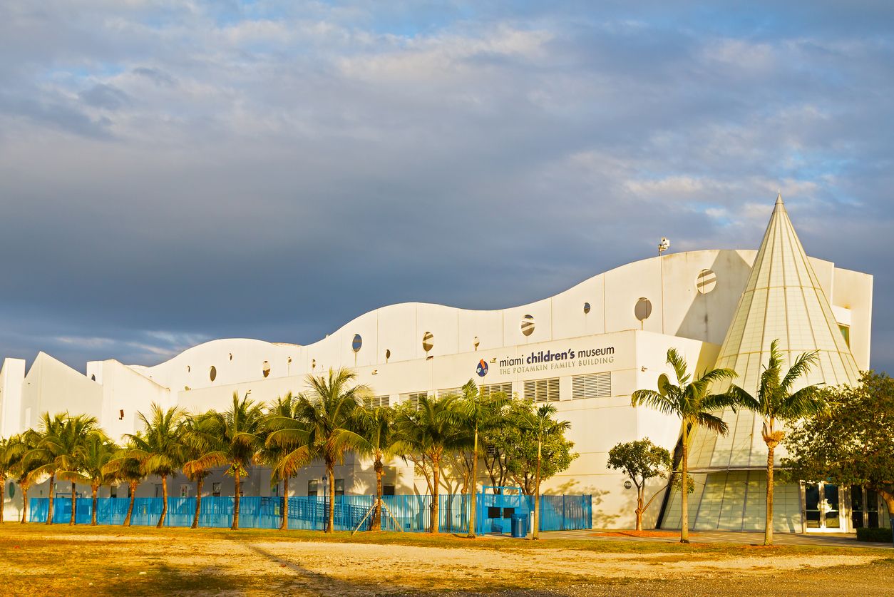 Miami Children’s Museum building surrounded by palms at sunset
