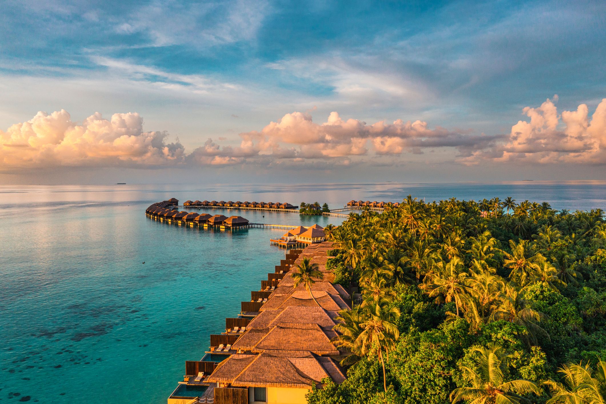 Aerial view of luxury resort in Maldives that can be enjoyed on a luxury vacation for under $15,000.