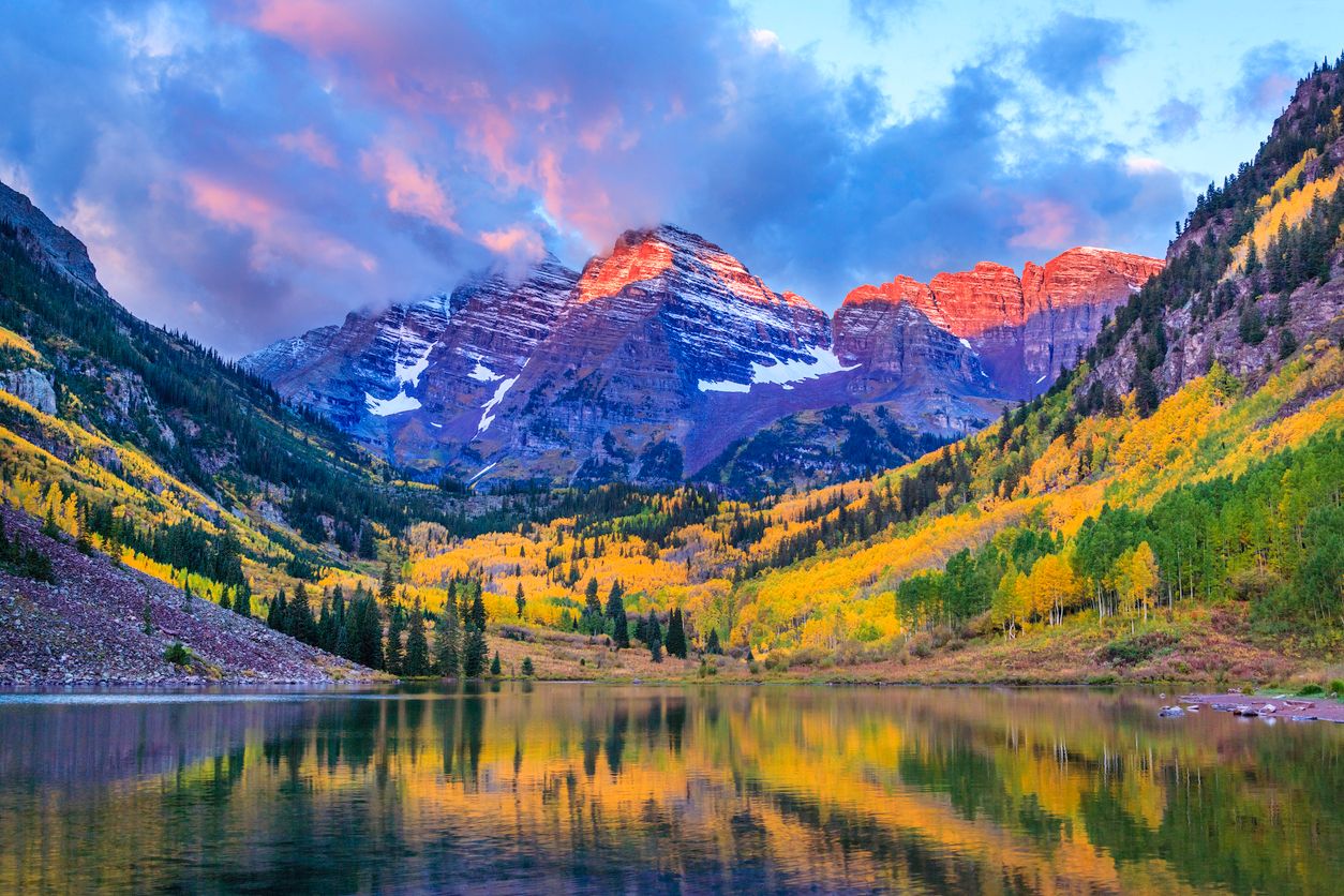 Maroon Bells and Maroon Lake - autumn colors at sunrise, near Aspen, Colorado, in the Elk Mountains