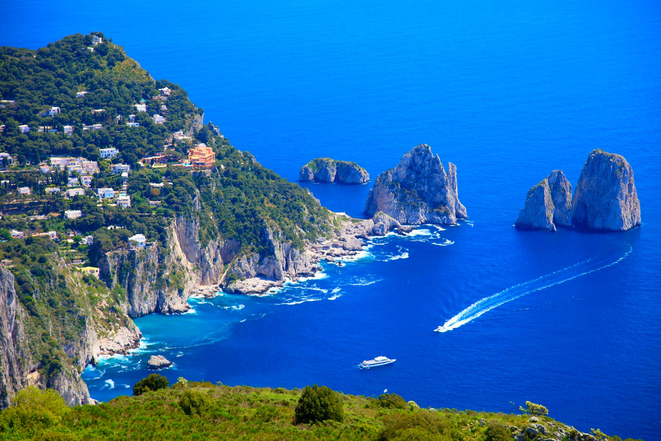 Capri island panorama from Monte Solaro, Faraglioni and Tyrrhenian sea, Bay of Naples, Italy