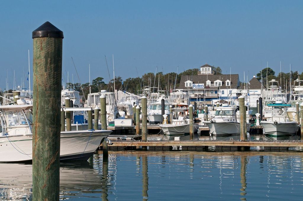 Boats docked at Rudee Inlet marina in Virginia Beach, Virginia