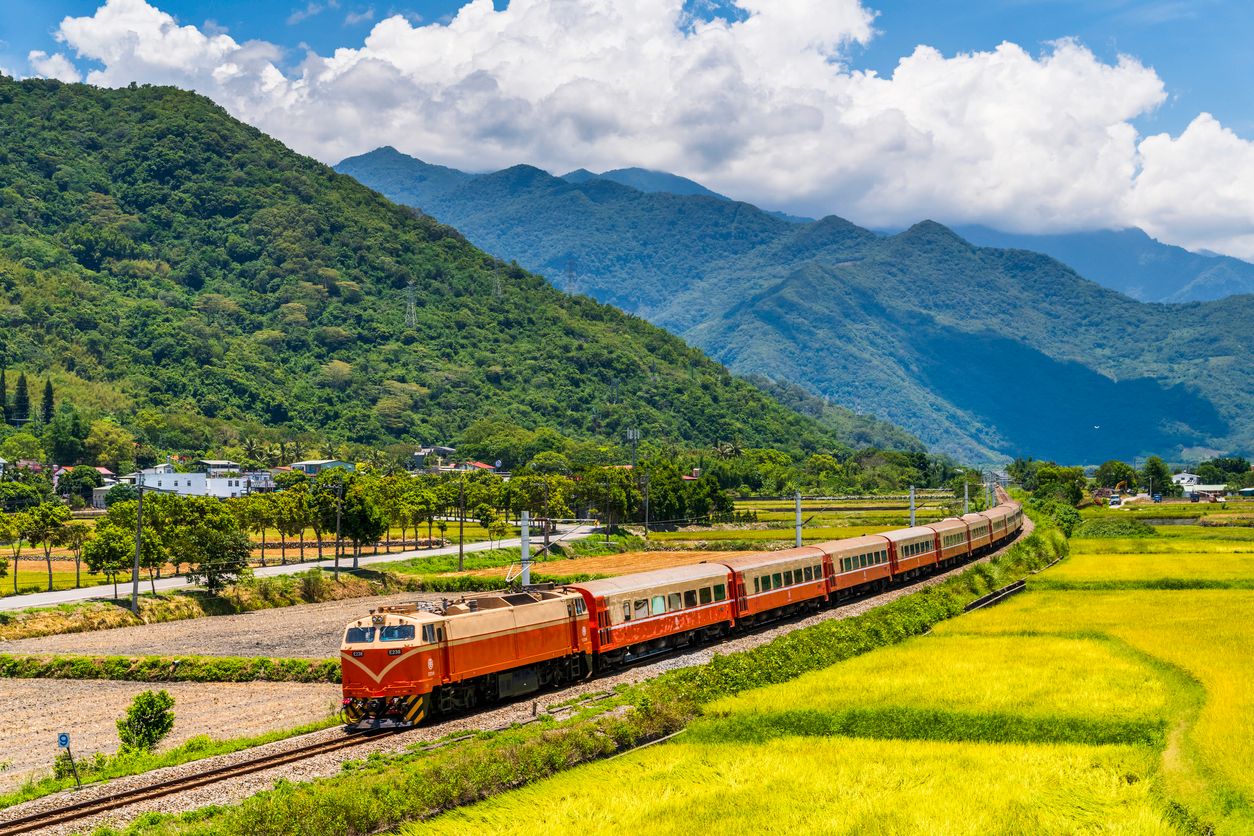 Chu-Kuang Express train traveling the beautiful countryside of Taitung, Taiwan