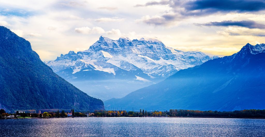 Switzerland Alps panorama at sunset from Lake Geneva