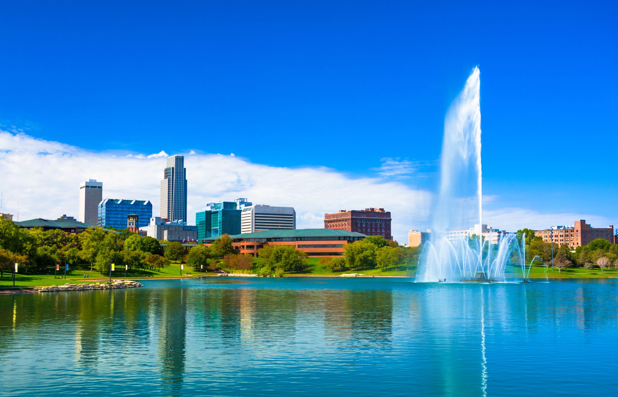 Downtown Omaha skyline with a large ornate fountain in the Heartland of America Park