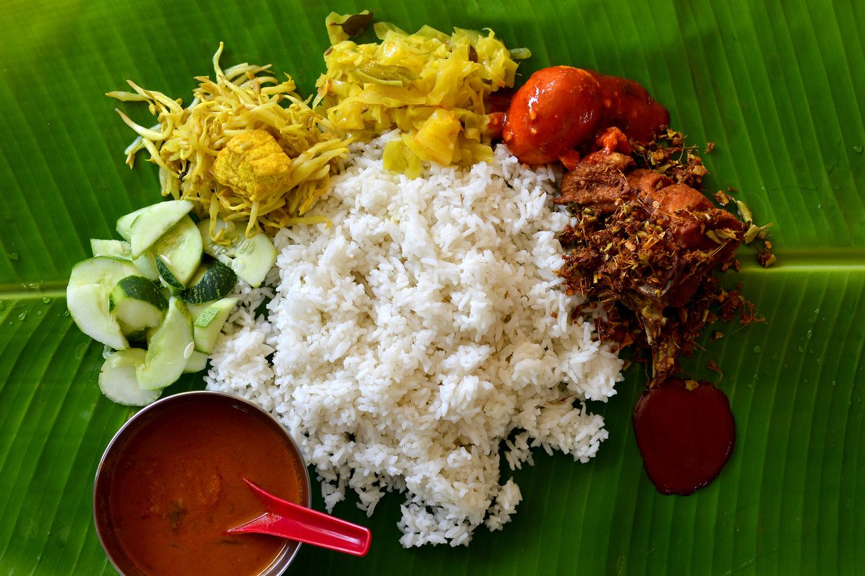 Nasi kandar is a popular northern Malaysian dish, which originates from Penang. It was popularized by Indian Muslim traders from India