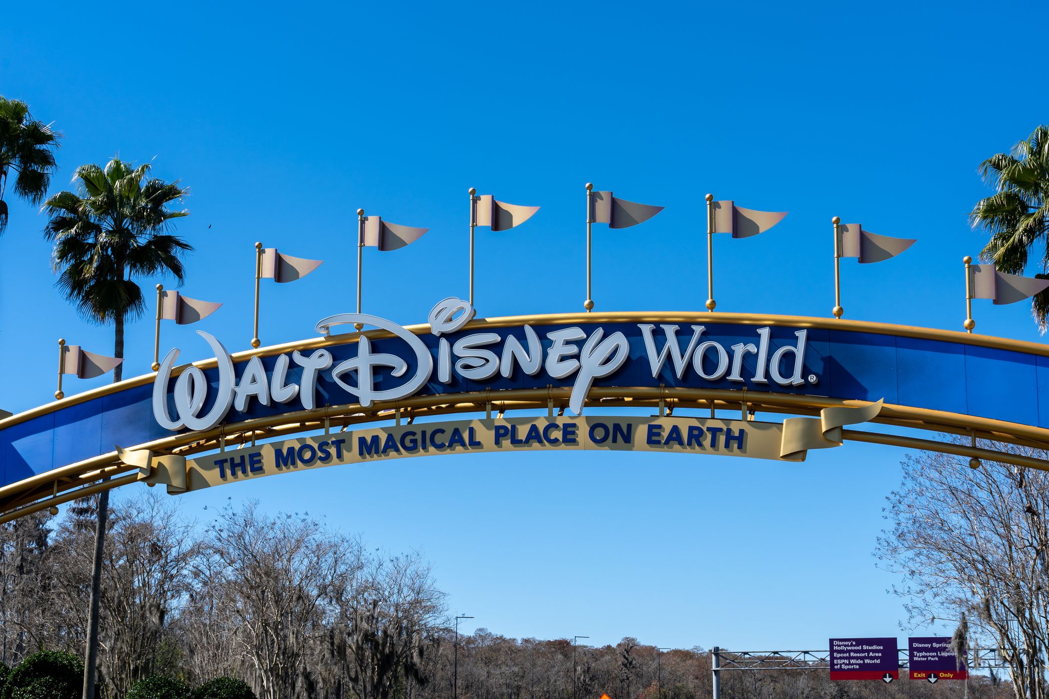 A Walt Disney World arch gate on the road in Orlando, Florida, USA