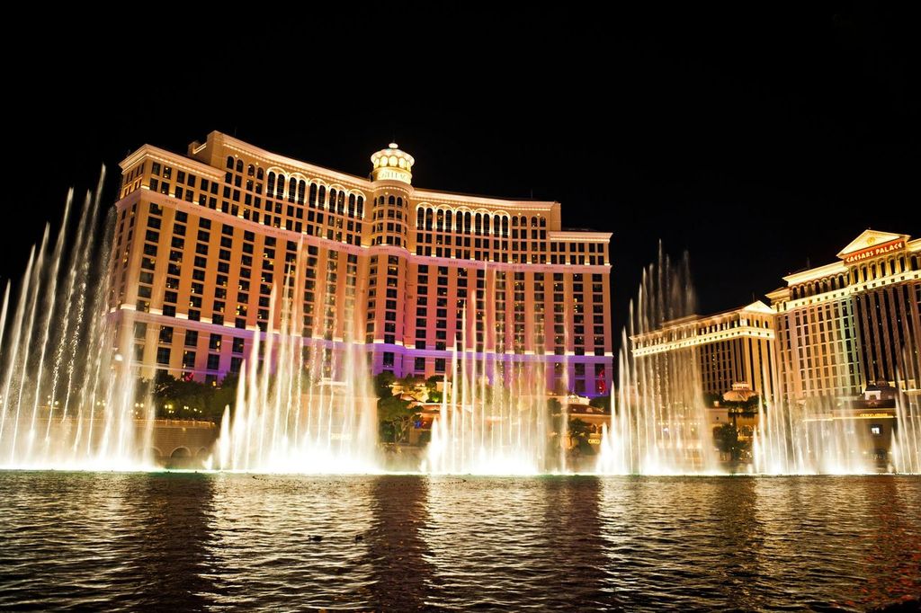 Bellagio Hotel and Caesars Palace with the fountains in front in Las Vegas, Nevada, USA