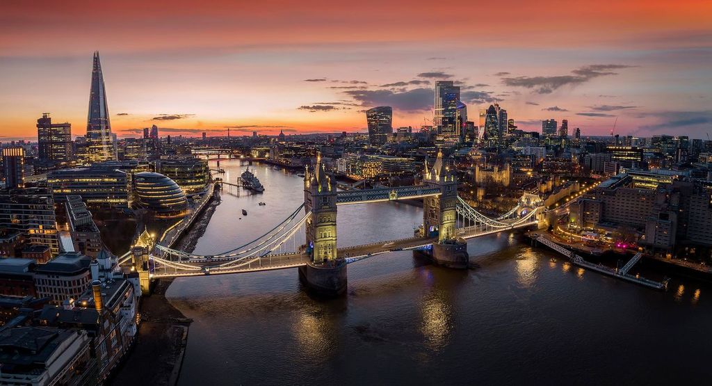 Panoramic, aerial view to the illuminated cityscape of London