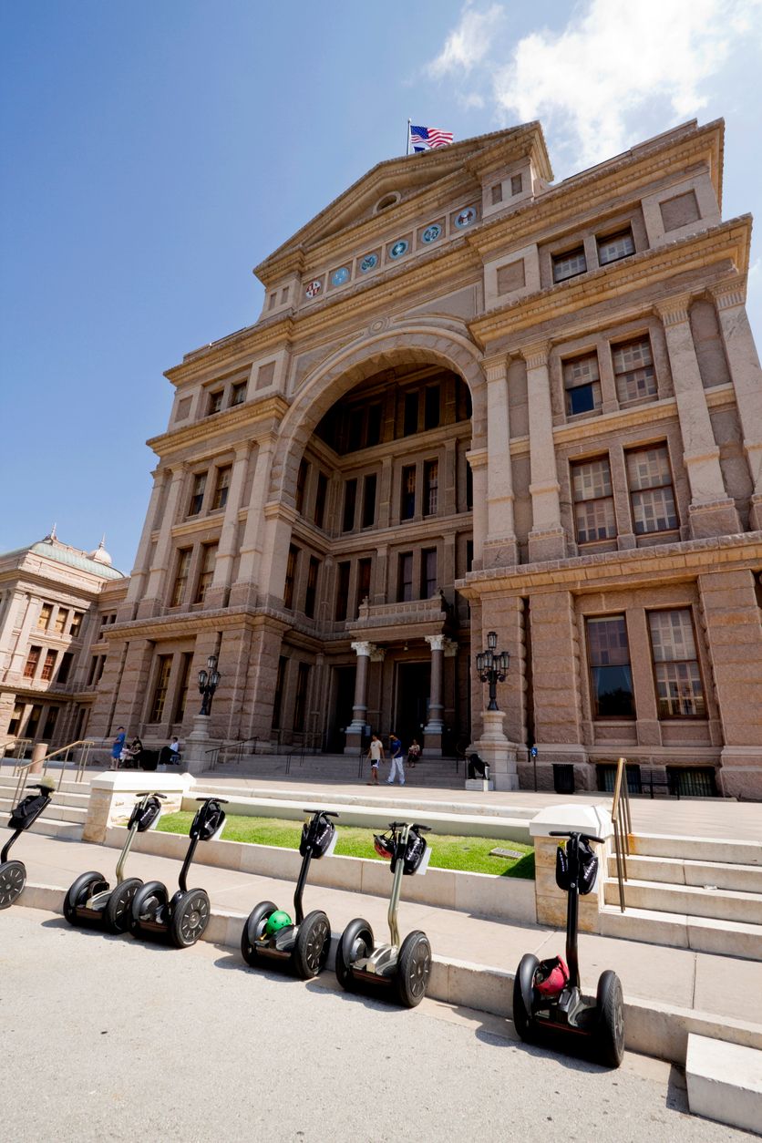 Segways Provide Easy Transportation for Tourists Visiting Texas State Capitol 