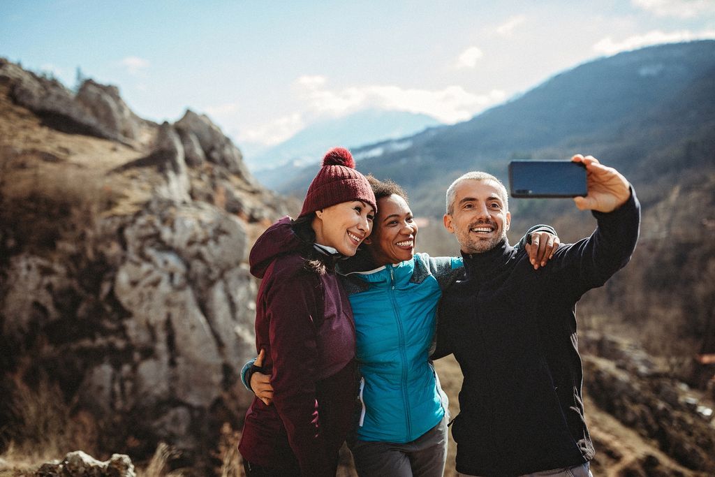 Group of hikers making memories on new adventure